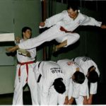Adrian McArther flying Side kick over 3 people