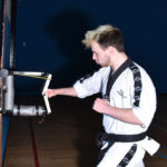 James with fore fist break at Evesham School of Taekwondo