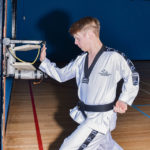 Oliver with palm break at Evesham School of Taekwondo