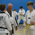 GM Dave Oliver Instructing William and Oliver during a training Lesson