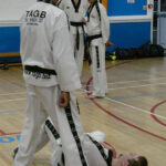 GM Dave Oliver Teaching a class at Evesham with Lea oliver at his feet